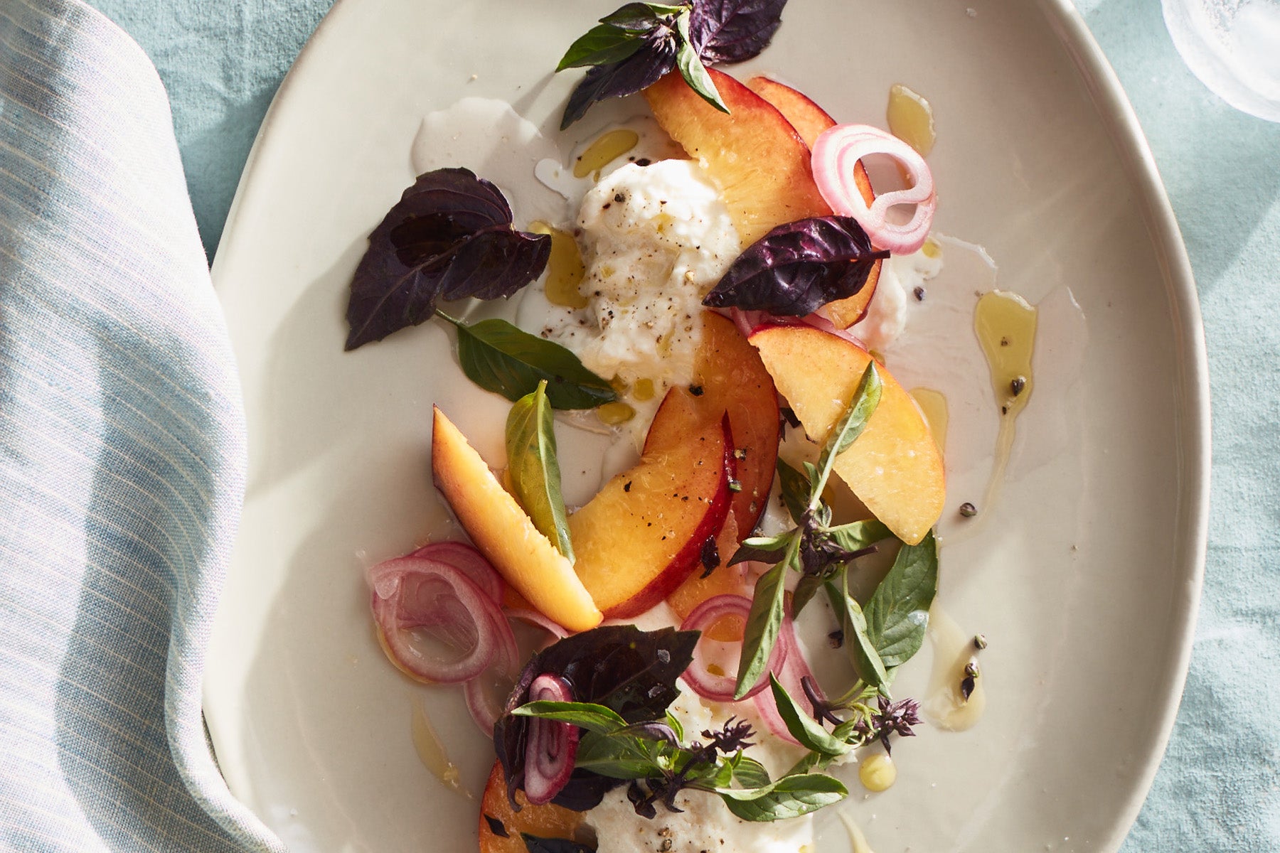 Peaches and Burrata with Pickled Shallot
–
                FIELD + SUPPLY