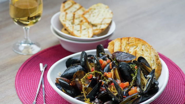 Steamed Mussels in Tomato Garlic Wine Broth with Grilled Bread